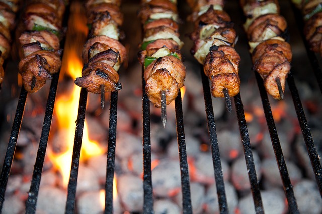 A picture of chicken on a barbecue